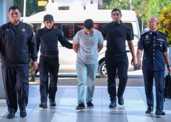 LELAKI intai wanita dalam tandas LRT didenda RM3,500 di Mahkamah Majistret Kuala Lumpur, hari ini. -UTUSAN/M.FIRDAUS M.JOHARI