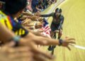 DATUK Azizulhasni Awang meraikan kejayaannya selepas memenangi perlumbaan akhir keirin lelaki di Velodrom Nasional Malaysia, Nilai di sini, hari ini. - UTUSAN/
ISKANDAR ISHAK