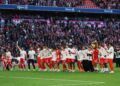Pemain Bayern Munich meraikan kejayaan menjuarai Bundesliga selepas menewaskan VfB Stuttgart 4-2 di Munich dengan Harry Kane turut menyumbang jaringan ke-32 musim ini. - AFP