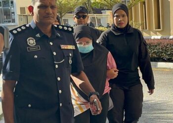 BALQISH Mohamad Dzyhan ketika hadir di Mahkamah Majistret di sini bagi pertuduhan membunuh seorang bayi lelaki berusia tujuh bulan, minggu lalu.