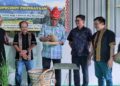 JONISTON Bangkuai menghadiri sambutan Kaamatan dan Moginakan di Kampung Sinulihan, Kiulu, Tuaran, Sabah hari ini. UTUSAN/HARDY JOE