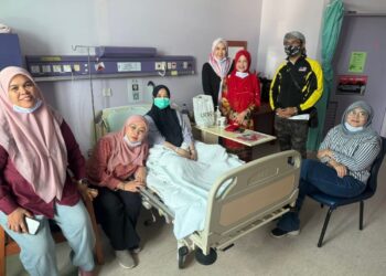 NURFITRI Mokhtar (tengah) masih menerima rawatan di HSAH akibat dibelasah suaminya lebih dua minggu lalu di Sungai Petani.