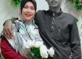 LIZA Ariffin bersama Allahyarham Muhammad Luqman Zurul Azli yang maut kemalangan di Jalan Lubok Gong-Jeram Perdah, Rantau Panjang, Kelantan.
