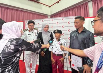 FARISH Danish Zulfadhli (tengah) katanya di Majlis Sambutan Hari Palang Merah dan Bulan Sabit Merah Sedunia 2026 hari ini.