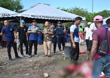HASROLNIZAM Shaari hadir membuat pemantauan aktiviti korban warga asing di Taman Melur, semalam.