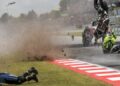 Pelumba pasukan Gresini Racing, Alex Marquez (kiri) terpelanting selepas terlibat kemalangan dalam perlumbaan MotoGP Grand Prix Catalunya di Montmelo, Barcelona, hari ini. - AFP
