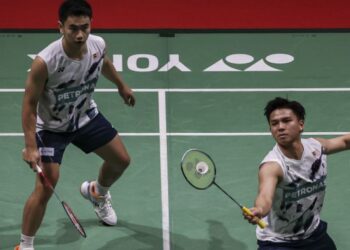 Goh Sze Fei-Nur Izzuddin Mohd Rumsani akan meneruskan latihan bersama beregu naungan Persatuan Badminton Malaysia (BAM). - UTUSAN/SHIDDIEQIIN ZON