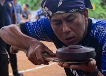 PERMINANAN gasing pangkah melambangkan kemahiran, stra­tegi dan ketahanan fizikal serta semangat kesukanan.