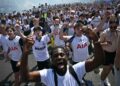 PENYOKONG Tottenham Hotspur meraikan kejayaan pasukan mereka kekal dalam saingan Liga Perdana Inggeris pada musim hadapan. - AFP