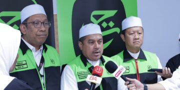 MOHD. Hisham Harun dalam sidang akhbar di Pejabat Operasi TH Mekah.