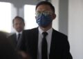MUHAMMAD Fathi Na'im Mazlam hadir untuk mendengar keputusan kes di Mahkamah Sesyen, Kuala Lumpur hari ini.