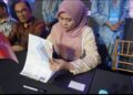 FATHIN Amelina Fazlie mengumumkan peletakan jawatan dan keluar PKR, hari ini. - FACEBOOK