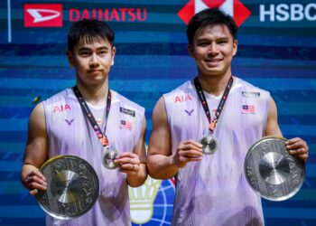 Goh Sze Fei-Nur Izzuddin terpaksa berpuas hati selaku naib juara Malaysia Masters 2026 di Unifi Arena, Bukit Jalil, Kuala Lumpur, hari ini- UTUSAN/IQBAL ROSLI