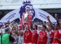 PEMAIN Arsenal meraikan kejayaan mereka menjulang trofi Liga Perdana Inggeris musim ini. - AFP