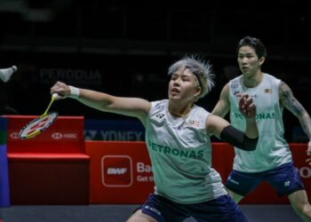 CHEN Tang Jie-Toh Ee Wei tewas kepada pasangan baharu China, Gao Jia Xuan-Wei Ya Xin 18-21, 16-21 pada aksi suku akhir Kejohanan Badminton Malaysia Masters 2026 di Unifi Arena, Bukit Jalil, hari ini. - UTUSAN/IQBAL ROSLI