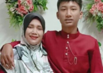 LIZA Ariffin bersama Allahyarham Muhammad Luqman Zurul Azli (kanan) yang maut kemalangan di Jalan Lubok Gong-Jeram Perdah, Rantau Panjang, Kelantan.