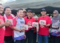 AHMAD Faizal Azumu (tiga dari kanan) pada Program Korban Perdana dan Kenduri Rakyat Bersatu Perak di Taiping hari ini. - UTUSAN/WAT KAMAL ABAS