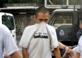 MUHAMAD Yaccob Ibrahim dihadapkan ke mahkamah atas pertuduhan menyimbah cat merah pada dua kediaman di Mahkamah Majistret, Johor Bahru, hari ini. - UTUSAN/RAJA JAAFAR ALI