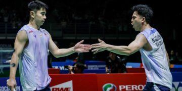 GOH Sze Fei-Nur Izzuddin Rumsani menyingkirkan pasangan Jepun, Kakeru Kumagai-Hiroki Nishi di Unifi Arena, Bukit Jalil, hari ini. - UTUSAN IQBAL