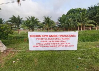 ISU tular apabila satu sepanduk meminta KPM mengambil tindakan ke atas pengetua SMK Bukit Rambai.