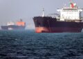 KAPAL tangki berbendera Gambia dilihat berlabuh di Selat Hormuz berhampiran Bandar Abbas di selatan Iran.-AFP