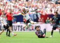 LEROY Sane(tengah) cuba melepasi halangan dari pemain Amerika Syarikat pada aksi persahabatan di Stadium Soldier Field,kelmarin-AFP
