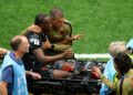 PEMAIN Kanada, Ismael Kone diusung keluar padang selepas mengalami kecederaan serius akibat terjahan pemain Qatar, Assim Madibo dalam aksi Kumpulan B Piala Dunia 2026 di Stadium BC Place, Vancouver, baru-baru ini. - AFP