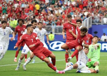 CRISTIANO Ronaldo membuktikan dirinya masih memiliki penyudah tajam apabila meledak dua gol ketika Portugal menewaskan Uzbekistan 5-0, sebentar tadi.-AFP