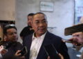 MUHAMMAD Sanusi Md. Nor ketika ditemui di pekarangan Pejabat Agung Pas, di sini hari ini.