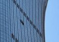 LUBANG terbentuk selepas pesawat merempuh Menara CITIC. - AFP