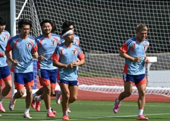 Pemain Jepun menjalani latihan menjelang perlawanan menentang Brazil dalam saingan kalah mati selepas ini. - AFP
