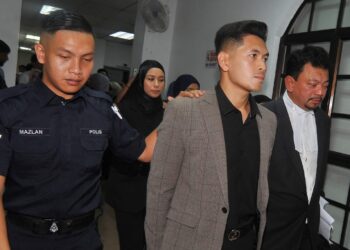 MAJIKAN yang dituduh memukul seorang pembantu rumah di hadapkan ke Mahkamah Majistret, Johor Bahru, Johor, semalam. 
– UTUSAN/RAJA JAAFAR ALI