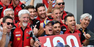PELUMBA Ducati, Marc Marquez meraikan kemenangan ke-100 dalam karier perlumbaan motosikal dunia bersama pasukannya selepas menjuarai Grand Prix Hungary di Litar Balaton Park, semalam. - AFP