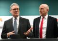 KEIR STARMER (kanan) dan John Healey. - AFP