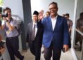 HAIM Hilman Abdullah dibawa ke Mahkamah Majistret Seremban semalam bagi berdepan pertuduhan mengeluarkan kenyataan dengan niat menyebabkan kebimbangan awam berhubung isu kemasukan pelajar ke universiti awam baru-baru ini. – UTUSAN/MOHD. SHAHJEHAN MAAMIN