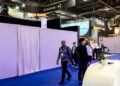 Pengunjung berjalan melintasi gerai tertutup syarikat Israel di Pusat Pameran Paris-Nord Villepinte, Villepinte, semalam. - AFP