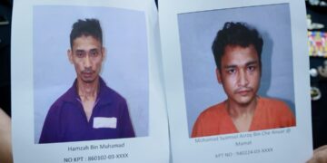MEJOH (kiri) bersama Mamat kini diburu polis bagi membantu siasatan kes culik di Tumpat dan Pasir Mas, Kelantan baru-baru ini-UTUSAN/KAMARUL BISMI KAMARUZAMAN