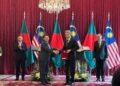 ANWAR Ibrahim dan Tarique Rahman menyaksikan pertukaran dokumen memorandum persefahaman antara kedua-dua negara.