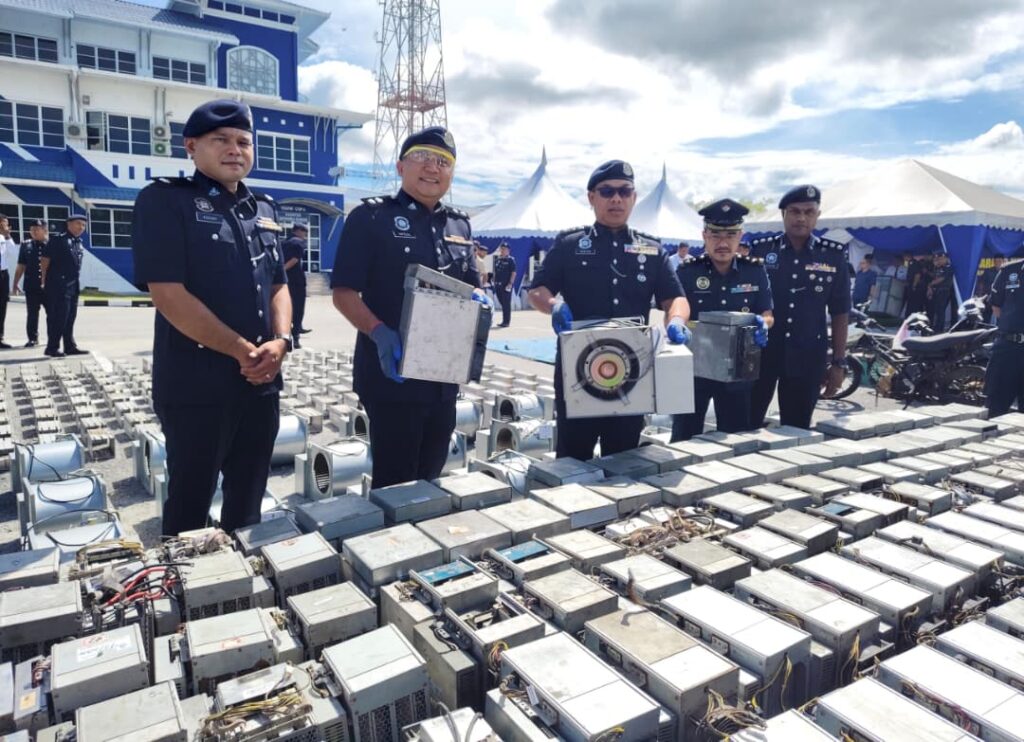 Malaysia police destroy weapons, bitcoin machines among criminal evidence