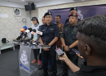 ABDUL Malik Hasim ketika sidang akhbar di IPD Tapah hari ini.
