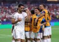MIKEL Merino meraikan jaringgannya ketika berdepan Portugal.- AFP