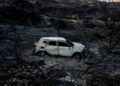 GAMBAR menunjukkan sebuah kereta terbakar di kawasan yang terjejas kebakaran hutan berhampiran Bedar, di wilayah Almeria, selatan Sepanyol.- AFP