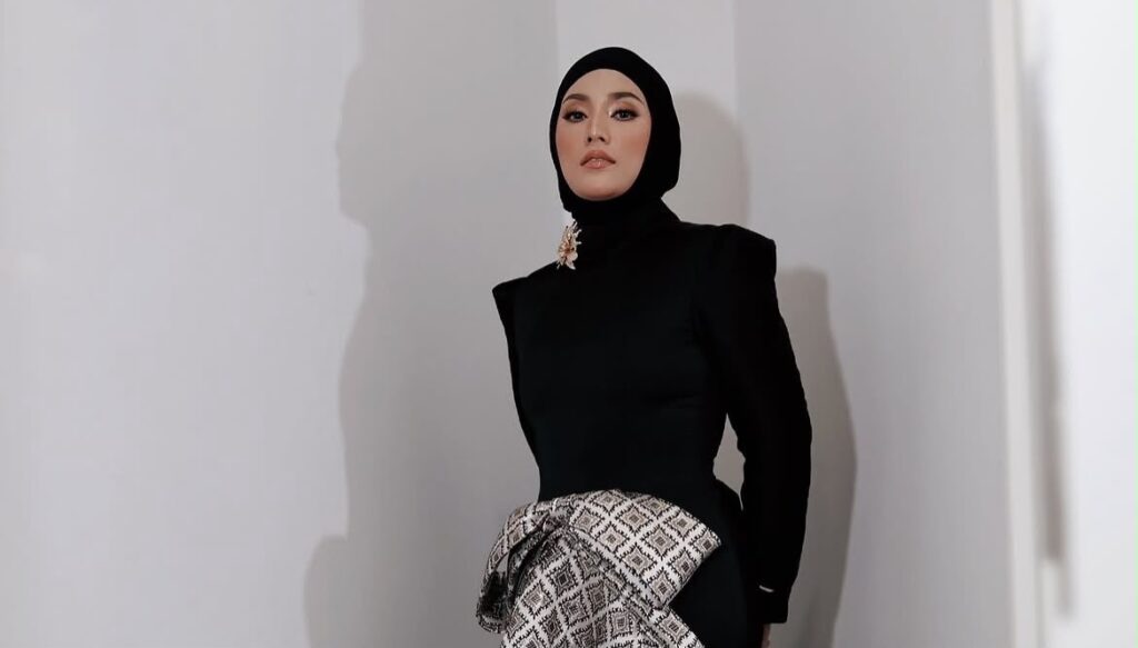 Shila Amzah fits into 10-year-old dress after weightlifting routine, calls it 'too loose' now