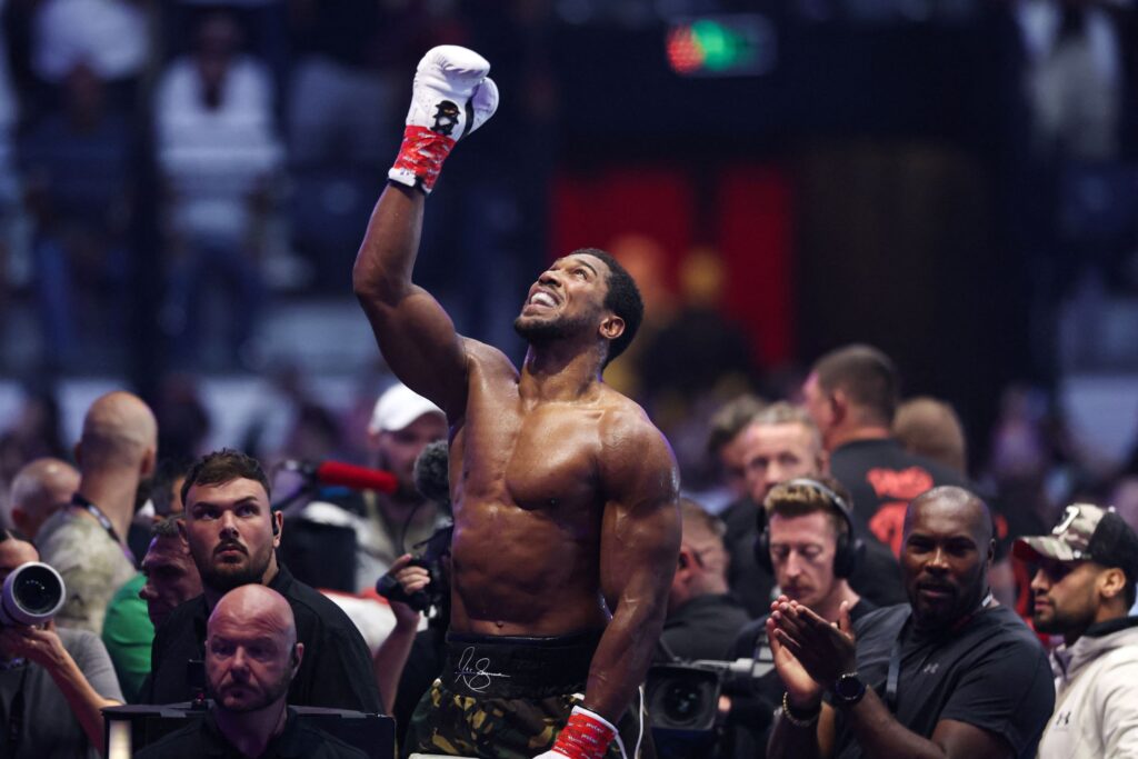 Joshua returns with KO win, eyes Fury fight