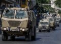 KENDERAAN tentera Israel bergerak ketika menjalankan serbuan di Nablus, di Tebing Barat. - AFP