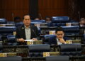 AHMAD MASLAN