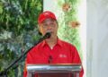 MUHYIDDIN Yassin ketika berucap pada majlis pengumuman calon Bersatu bagi PRN Negeri Sembilan di Nilai, Negeri Sembilan hari ini.-UTUSAN/ISKANDAR ISHAK