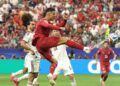AKSI Cristiano Ronaldo dalam perlawanan Portugal menentang Sepanyol di Stadium Dallas, semalam. - AFP