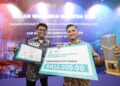 MUHAMMAD Fariz Rusadio meraih pemenang emas bagi kategori Foto Kewartawanan Terbaik dan membawa pulang wang tunai RM 10 000 serta sijil dan trofi diikuti oleh pemenang perak kategori yang sama juga Jurufoto Utusan Malaysia, Muhammad Syakir Radin Ab Halim pada Malam Wartawan Malaysia 2026 & Hadiah Kewartawanan Malaysia MPI-Petronas 2025 di Hotel Majestic di sini hari ini. - UTUSAN/AMIR KHALID