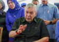 AHMAD Zahid Hamidi selepas Program Salam Agrikomoditi Madani di Dataran Melang, Kuala Pilah, hari ini.-UTUSAN/ISKANDAR ISHAK